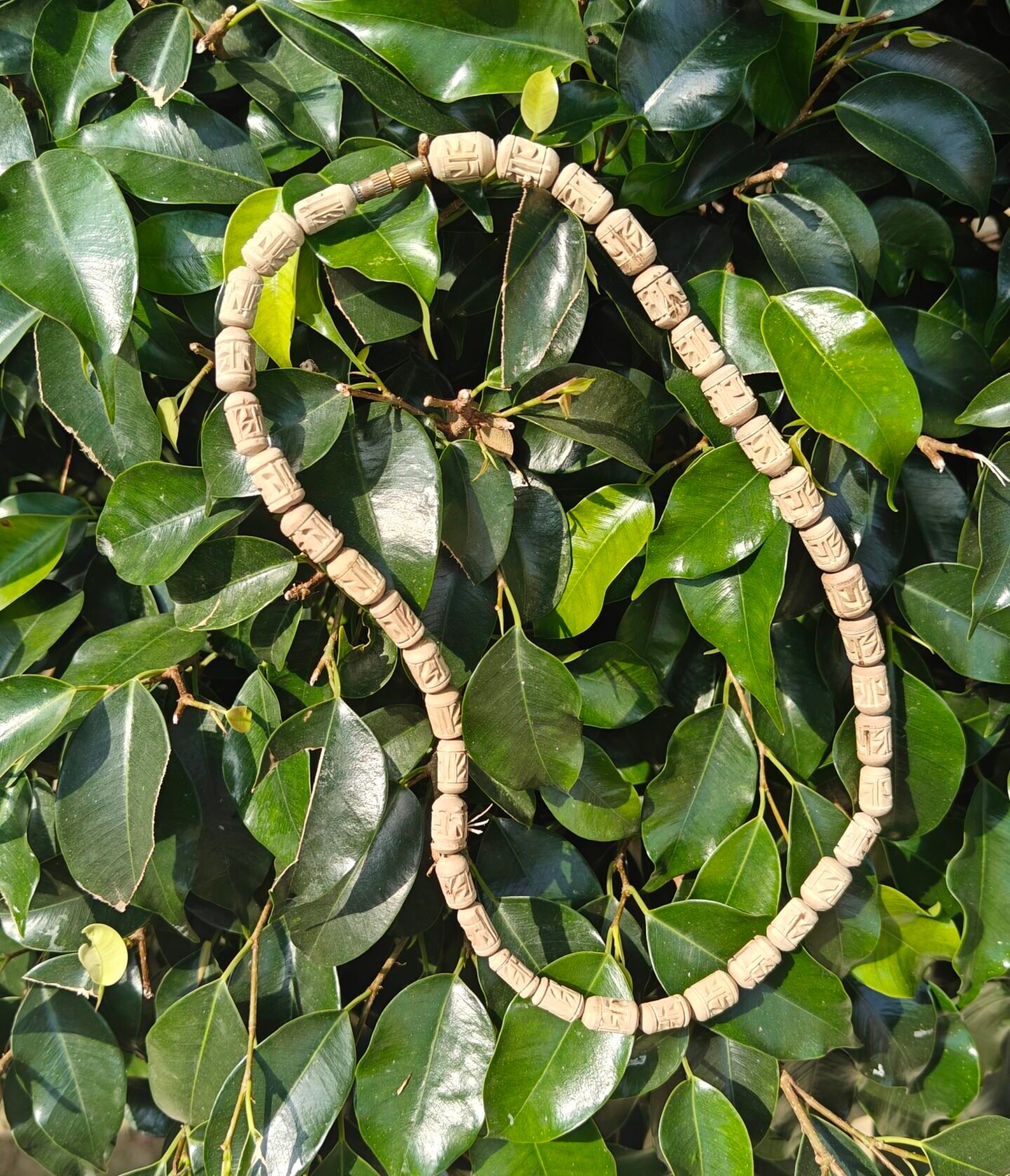 Radha Naam Carved Tulsi Kanthi Mala - Image 1